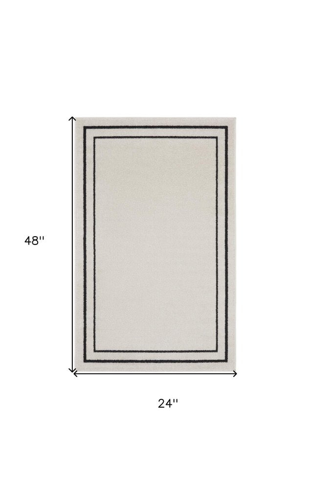 2' X 4' Ivory And Black Indoor Outdoor Area Rug HomeRoots