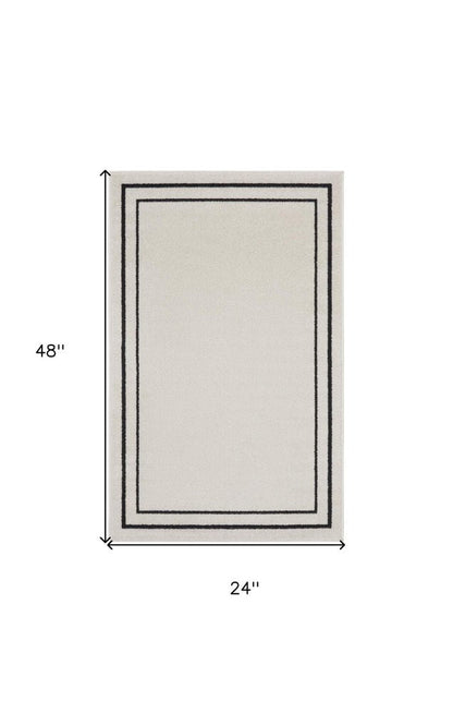 2' X 4' Ivory And Black Indoor Outdoor Area Rug HomeRoots