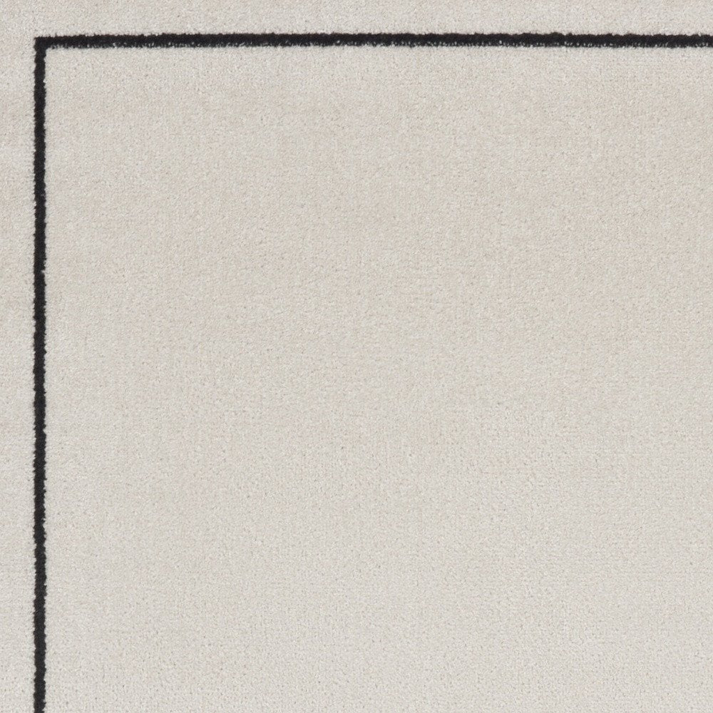 2' X 4' Ivory And Black Indoor Outdoor Area Rug HomeRoots