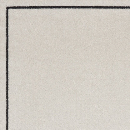 2' X 4' Ivory And Black Indoor Outdoor Area Rug HomeRoots