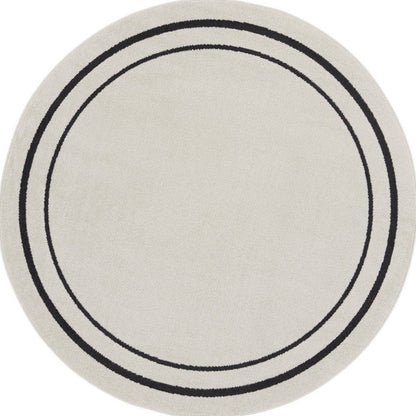 6' Ivory And Black Round Indoor Outdoor Area Rug