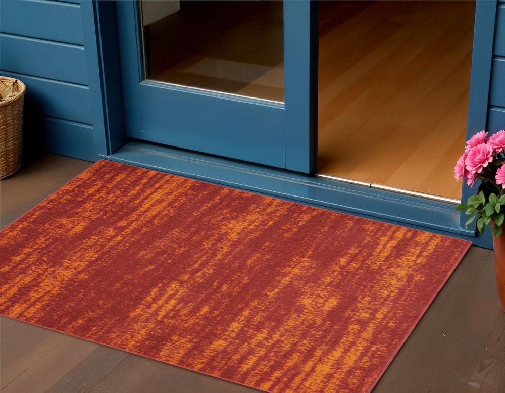 2' X 4' Red And Orange Abstract Indoor Outdoor Area Rug — view 4
