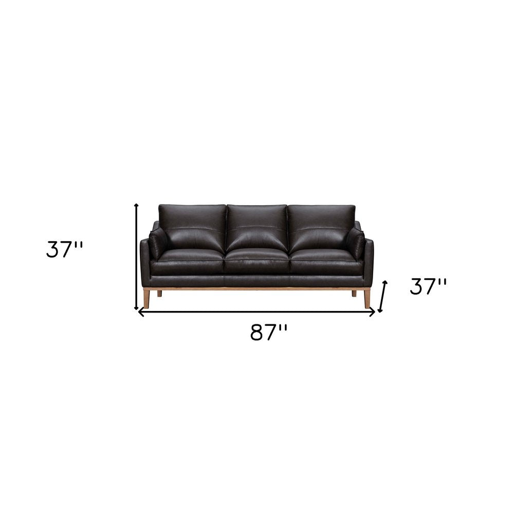 87" Dark Brown Leather Sofa And Toss Pillows With Brown Legs HomeRoots