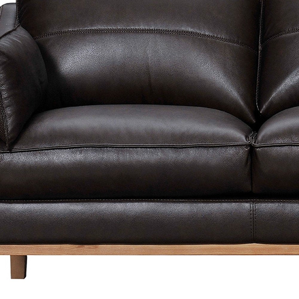 87" Dark Brown Leather Sofa And Toss Pillows With Brown Legs HomeRoots