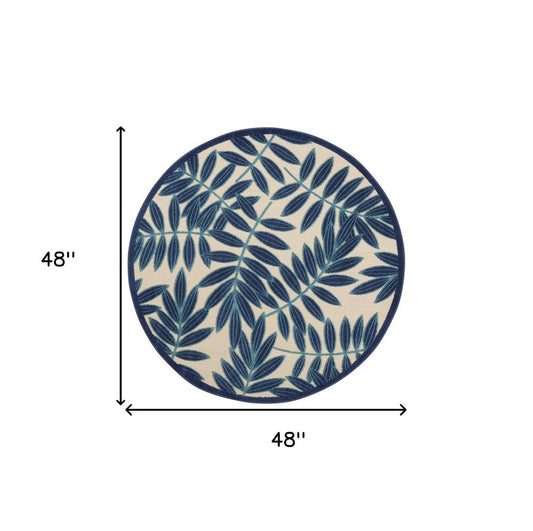 4' Navy Blue And Ivory Round Botanical Leaves Indoor Outdoor Area Rug