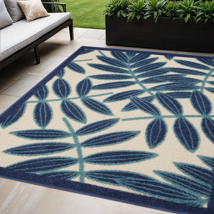 5' X 8' Navy Blue And Ivory Palm Leaf Indoor Outdoor Area Rug HomeRoots