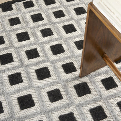 4' Black And White Round Geometric Indoor Outdoor Area Rug HomeRoots