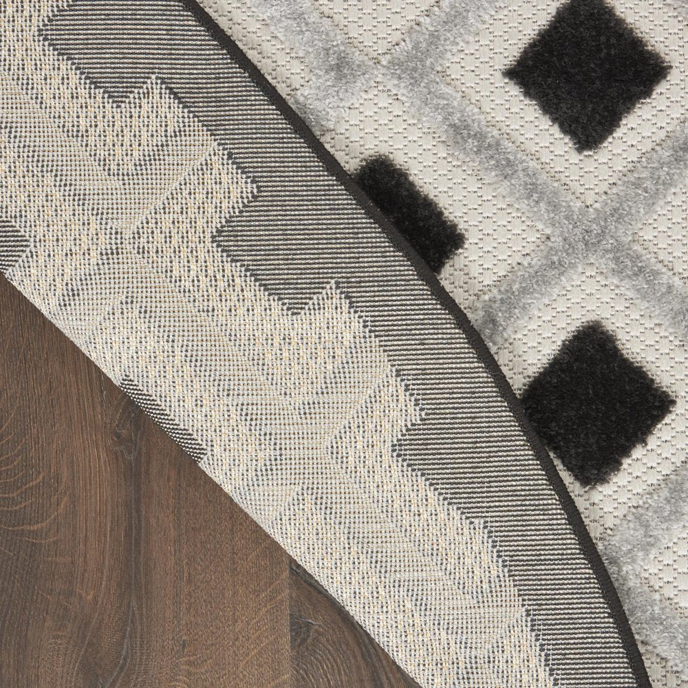 4' Black And White Round Geometric Indoor Outdoor Area Rug HomeRoots