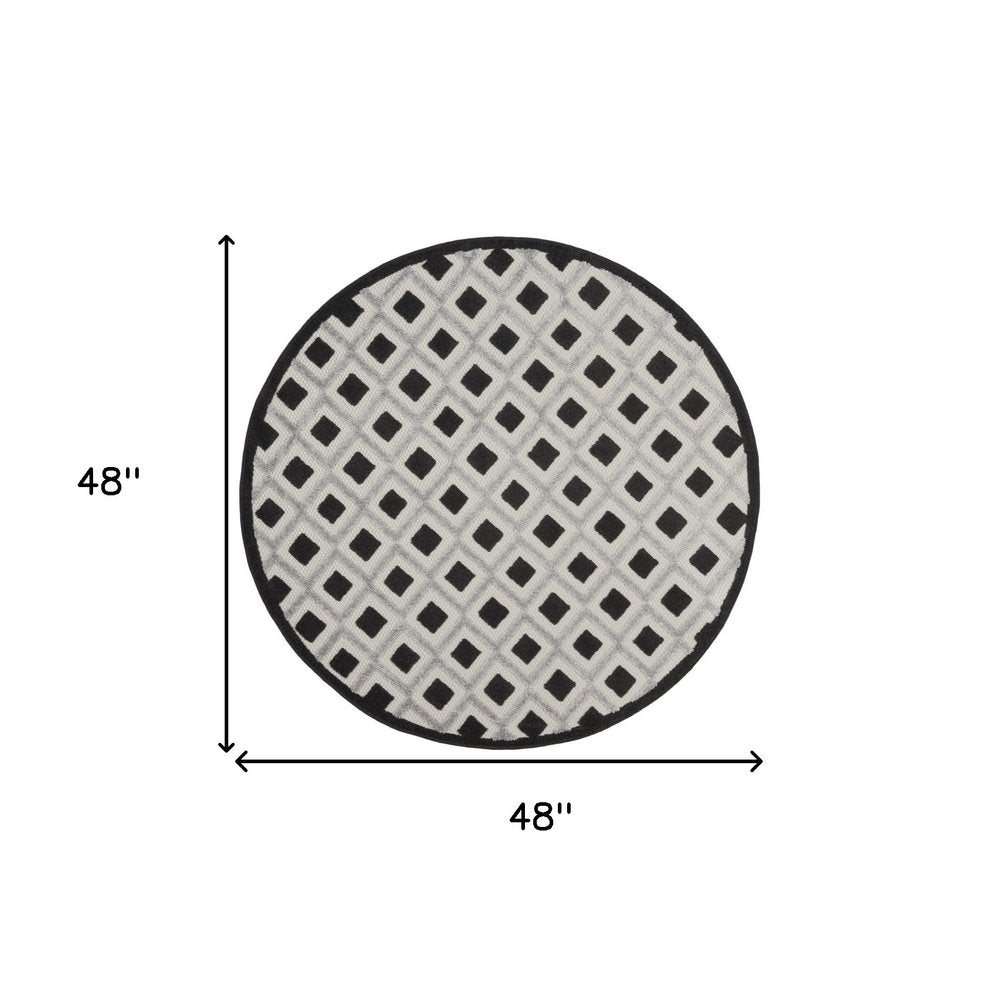 4' Black And White Round Geometric Indoor Outdoor Area Rug HomeRoots