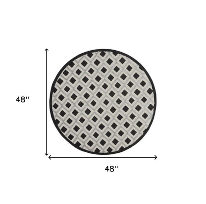4' Black And White Round Geometric Indoor Outdoor Area Rug HomeRoots