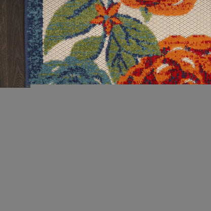 8' Ivory Orange And Blue Floral Indoor Outdoor Runner Rug