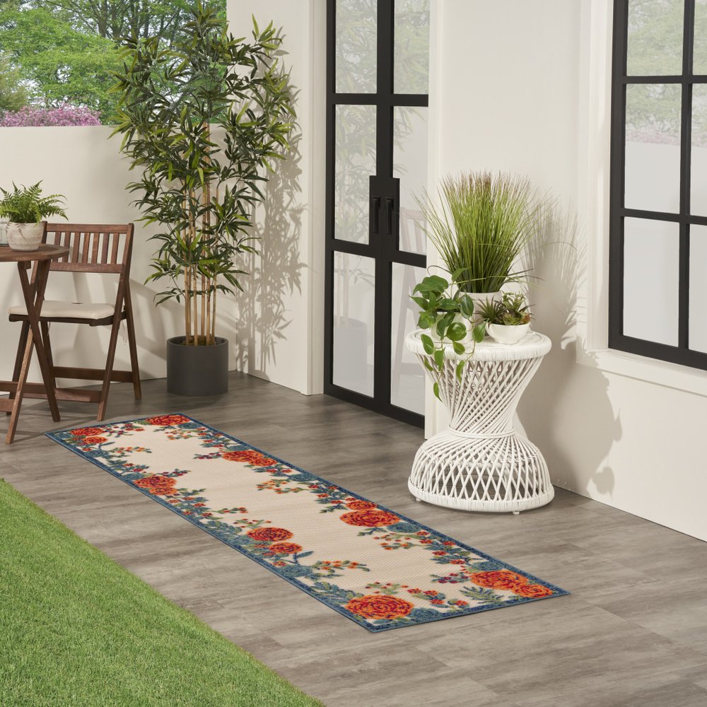 8' Ivory Orange And Blue Floral Indoor Outdoor Runner Rug