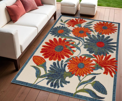 8' X 11' Ivory Blue And Orange Floral Indoor Outdoor Area Rug HomeRoots