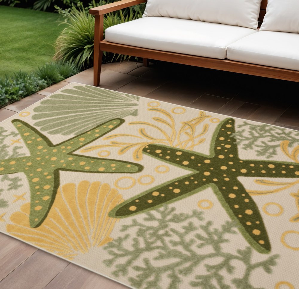 9' X 12' Green Yellow Blue Ivory And Dark Green Starfish Indoor Outdoor Area Rug HomeRoots