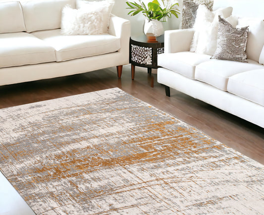 6' X 8' Gray and Gold Abstract Non Skid Area Rug - 60.0" (H) x 84.0" (W) x 0.12" (D)