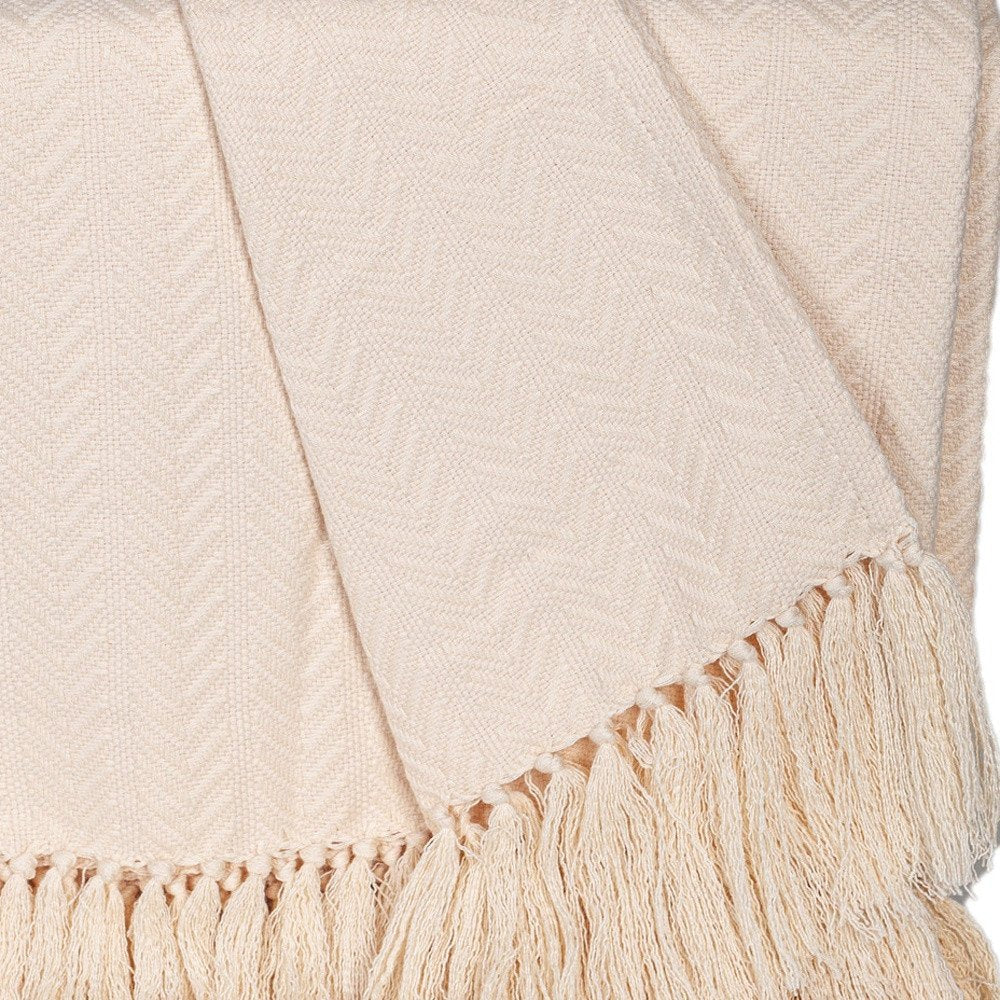 50" X 60" Cream Woven Cotton Herringbone Throw Blanket with Fringe HomeRoots