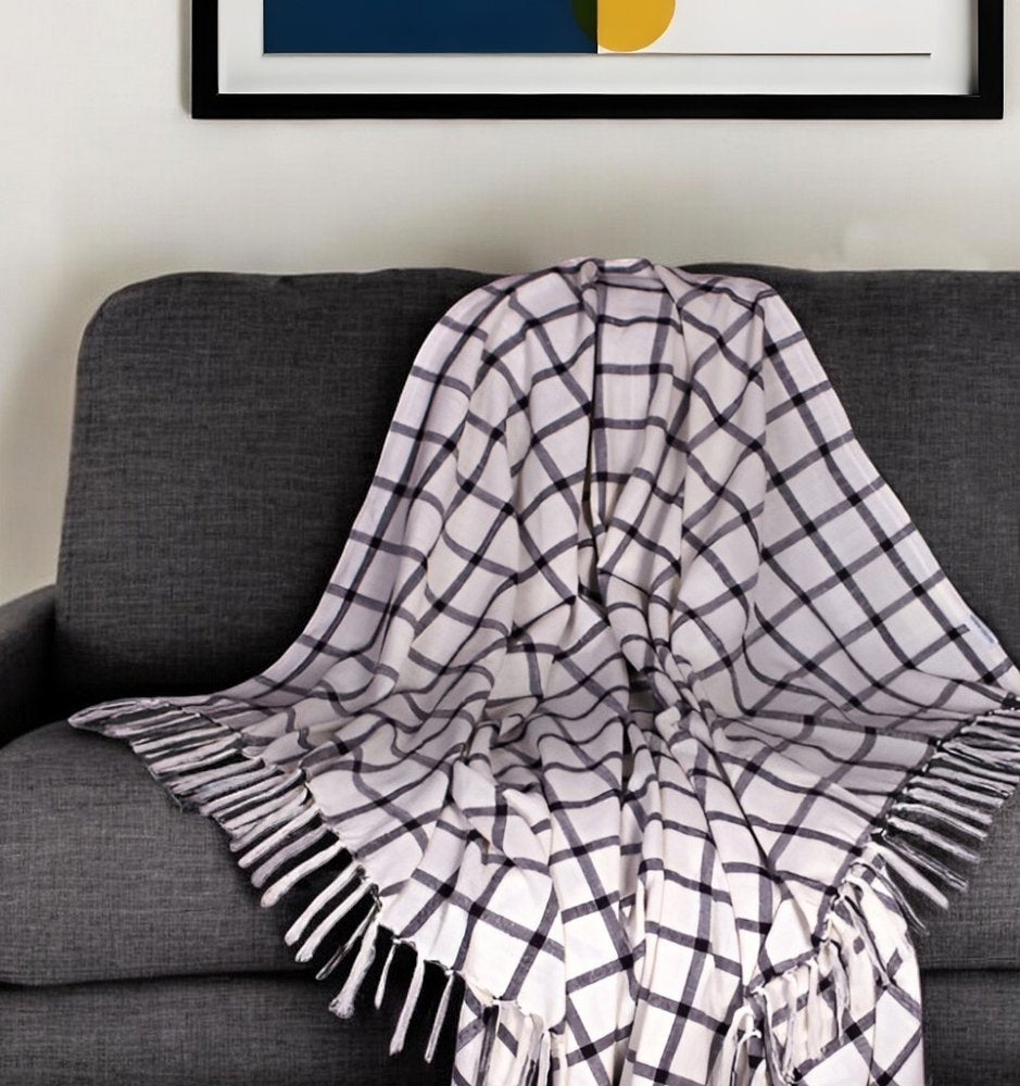 50" X 60" Black and Off White Cotton Woven Plaid Throw Throw Blanket with Fringe HomeRoots