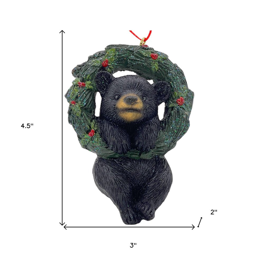5" Black Green And Red Resin Bear Christmas Santa Figurine HomeRoots