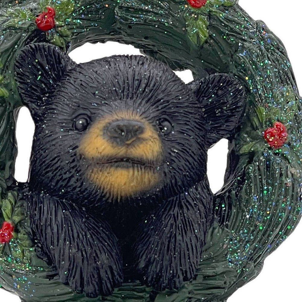 5" Black Green And Red Resin Bear Christmas Santa Figurine HomeRoots