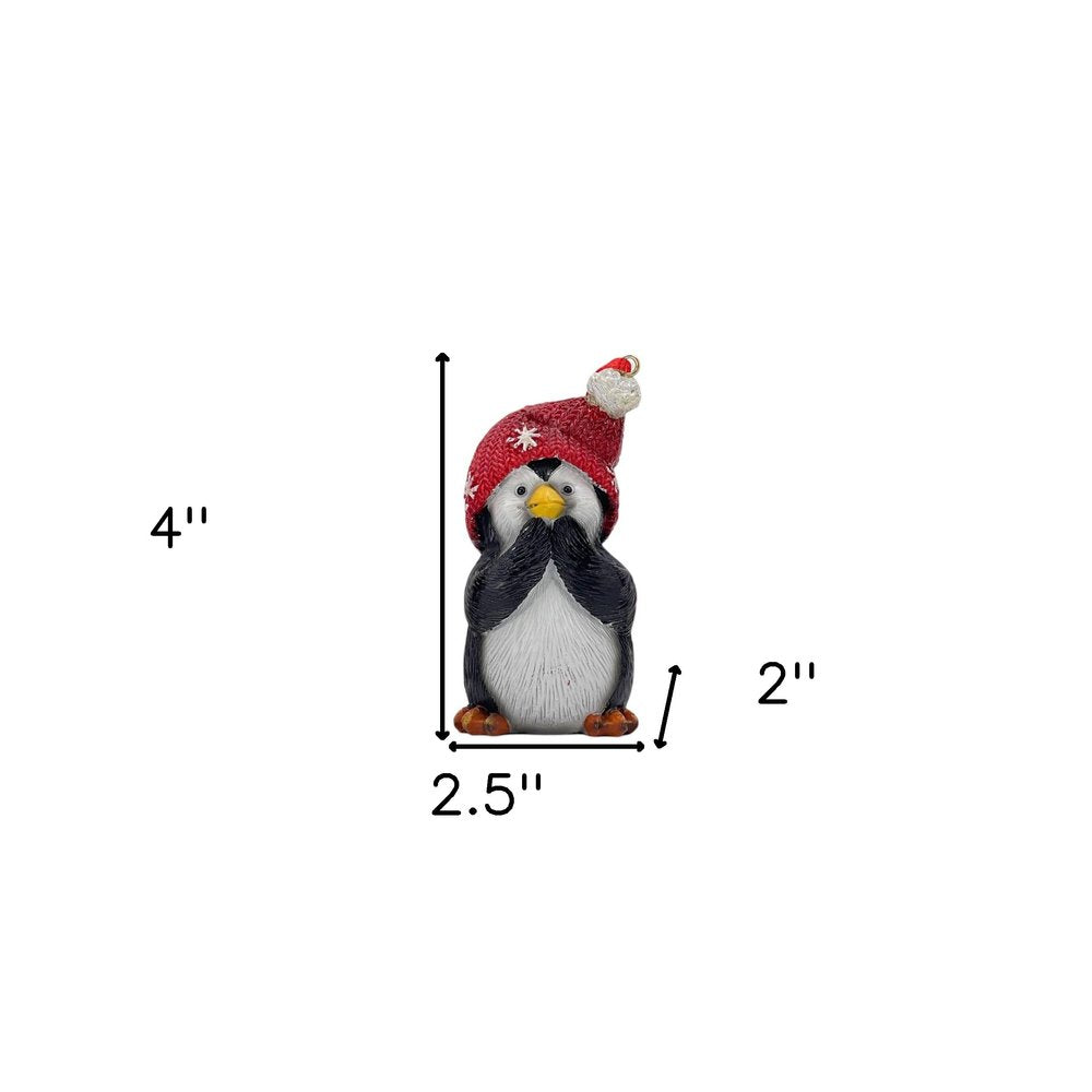 Set of Three Black White And Red Resin Penguin Christmas Reindeer Figurine HomeRoots