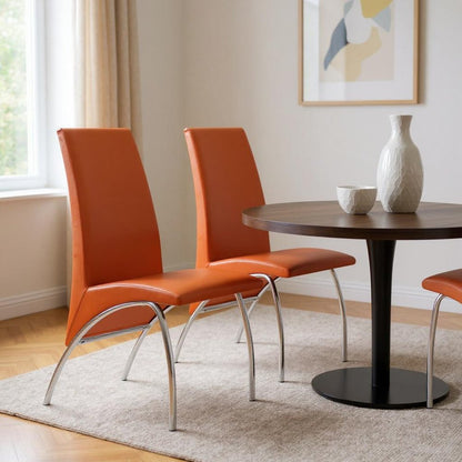 Set of Two Orange And Silver Upholstered Faux Leather Dining Side Chairs HomeRoots