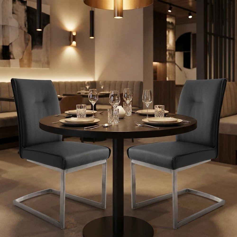 Set of Two White And Silver Tufted Faux Leather And Stainless Steel Dining Side Chairs HomeRoots