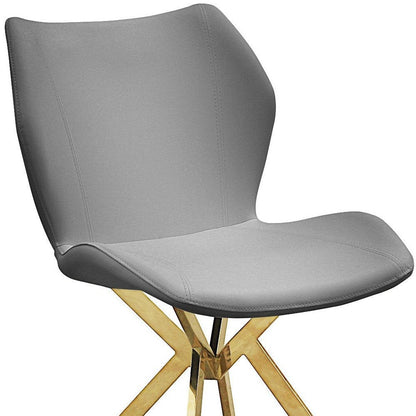Set of Four Gray And Gold Faux Leather And Metal Dining Side Chairs HomeRoots