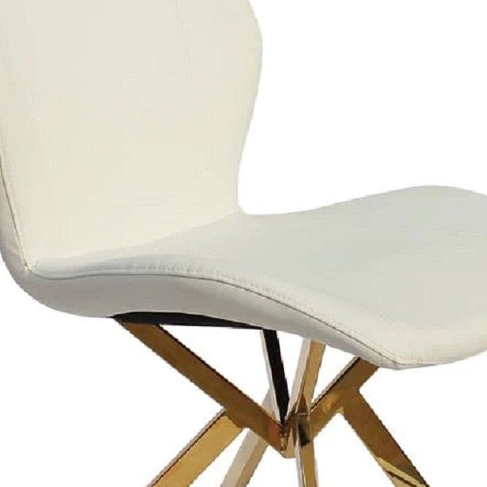Set of Four Gray And Gold Faux Leather And Metal Dining Side Chairs HomeRoots