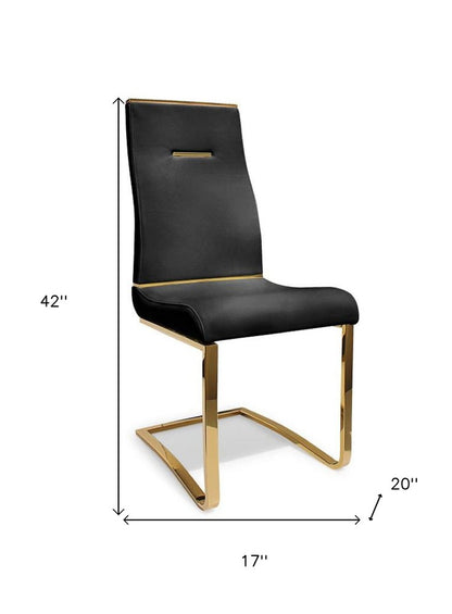 Set of Two Black And Gold Faux Leather And Stainless Steel Dining Side Chairs HomeRoots