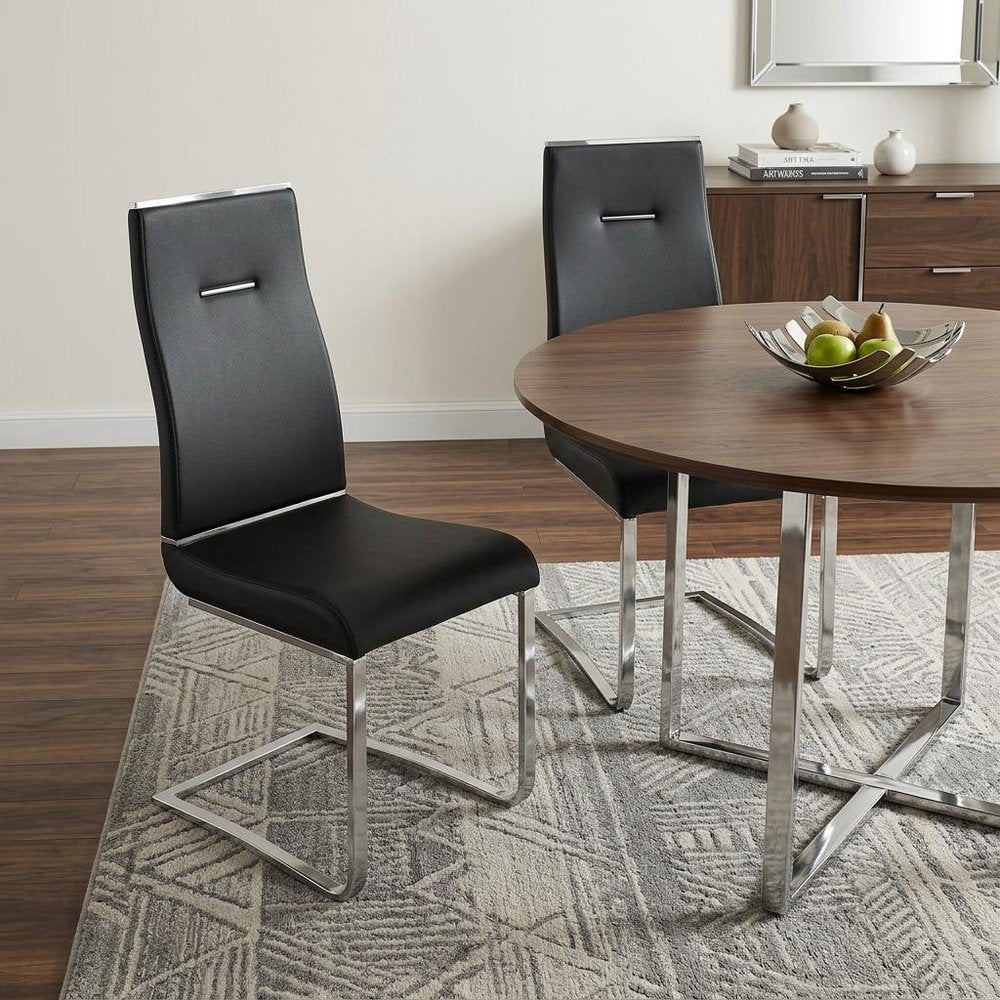 Set of Two Black And Silver Faux Leather And Stainless Steel Dining Side Chairs HomeRoots
