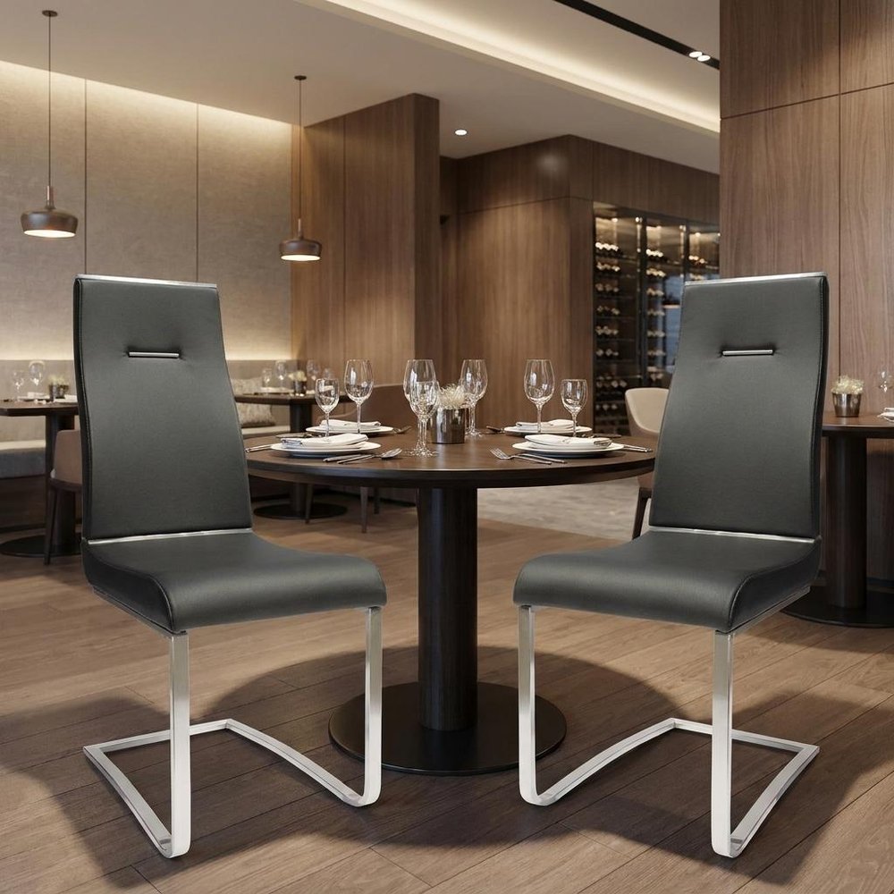 Set of Two Black And Silver Faux Leather And Stainless Steel Dining Side Chairs HomeRoots
