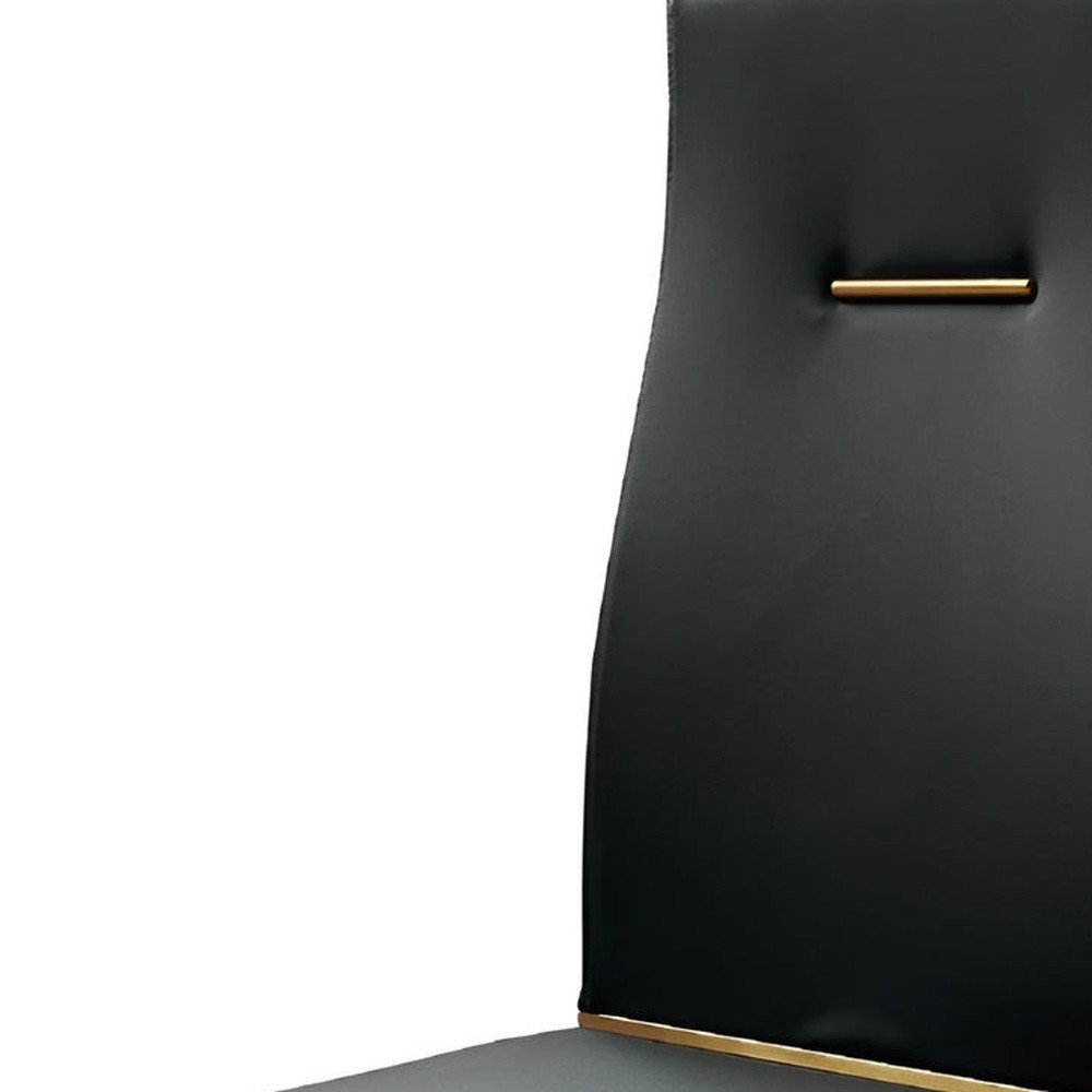 Set of Four Black and Gold Upholstered Faux Leather Dining Side Chairs HomeRoots