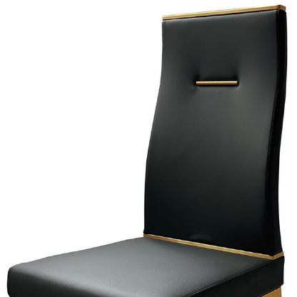 Set of Four Black and Gold Upholstered Faux Leather Dining Side Chairs HomeRoots
