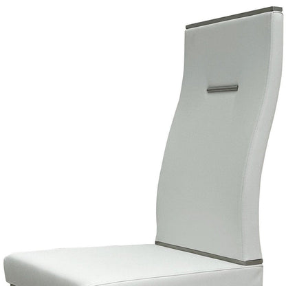 Set of Four White and Silver Upholstered Faux Leather Dining Side Chairs HomeRoots