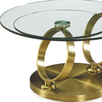 32" Clear And Gold Glass And Metal Round Abstract Coffee Table HomeRoots