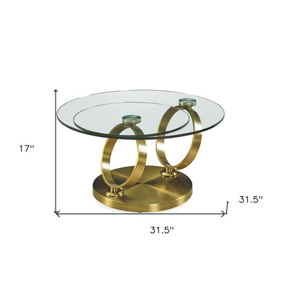 32" Clear And Gold Glass And Metal Round Abstract Coffee Table HomeRoots