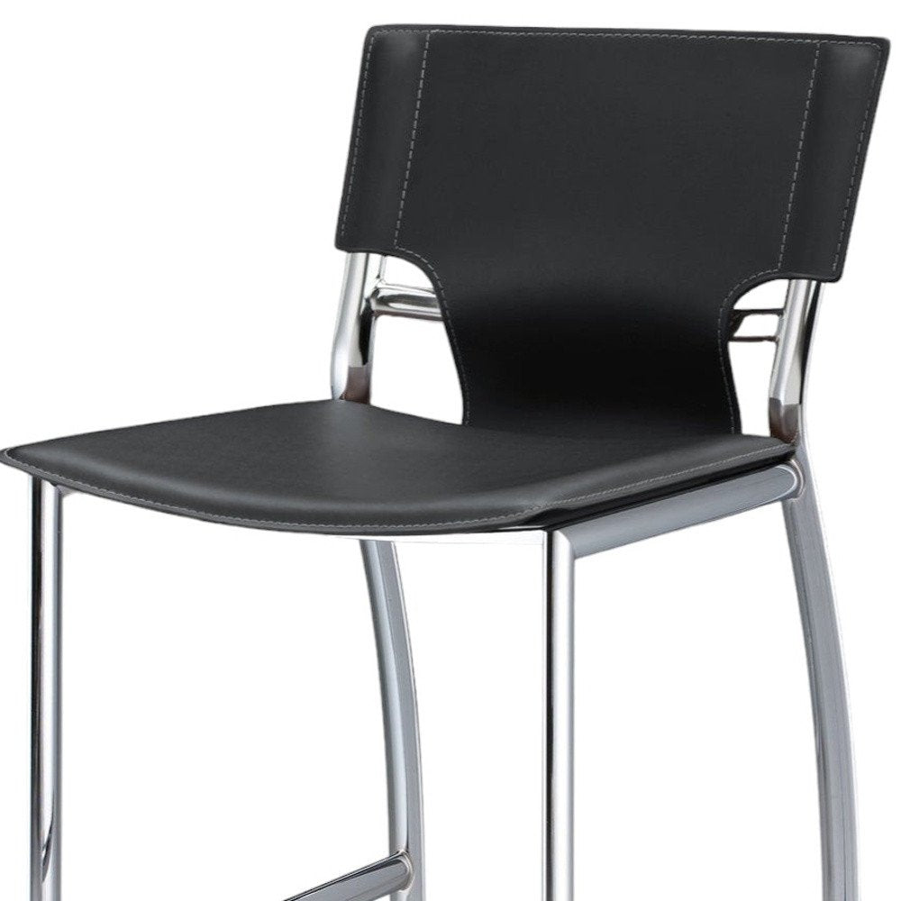 Set of Two 25" Gray And Silver Faux Leather And Metal Low Back Counter Height Bar Chairs HomeRoots