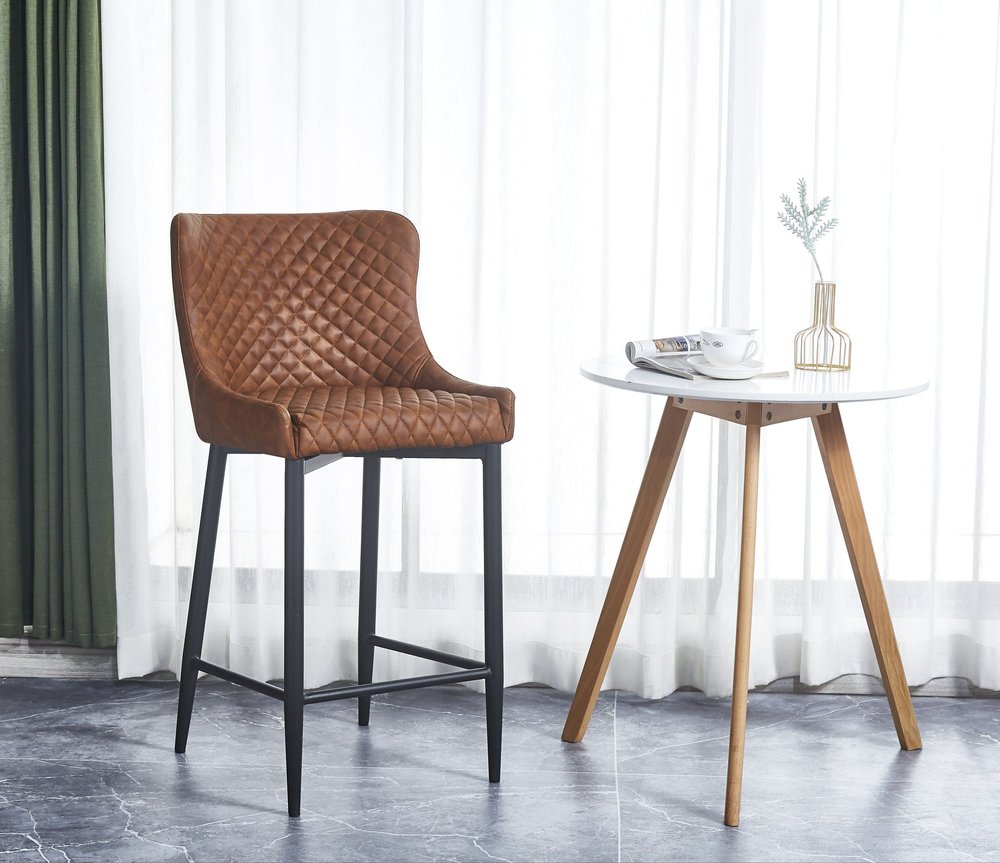 Set of Two 26" Orange And Black Faux Leather And Metal Low Back Counter Height Bar Chairs HomeRoots