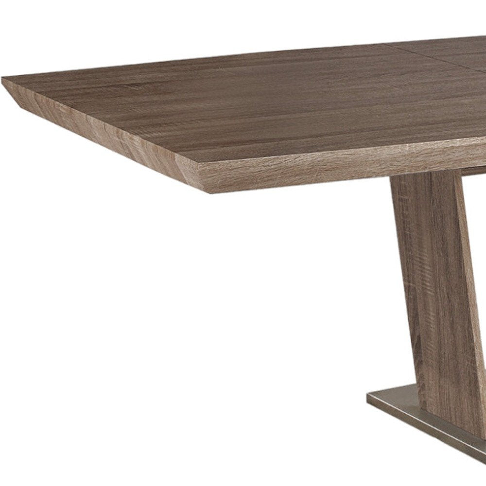 71" Gray Wood and Metal Self-Storing Leaf Pedestal Base Extendable Dining Table HomeRoots
