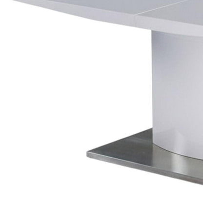 63" White Wood And Metal Self-Storing Leaf Pedestal Base Extendable Dining Table HomeRoots