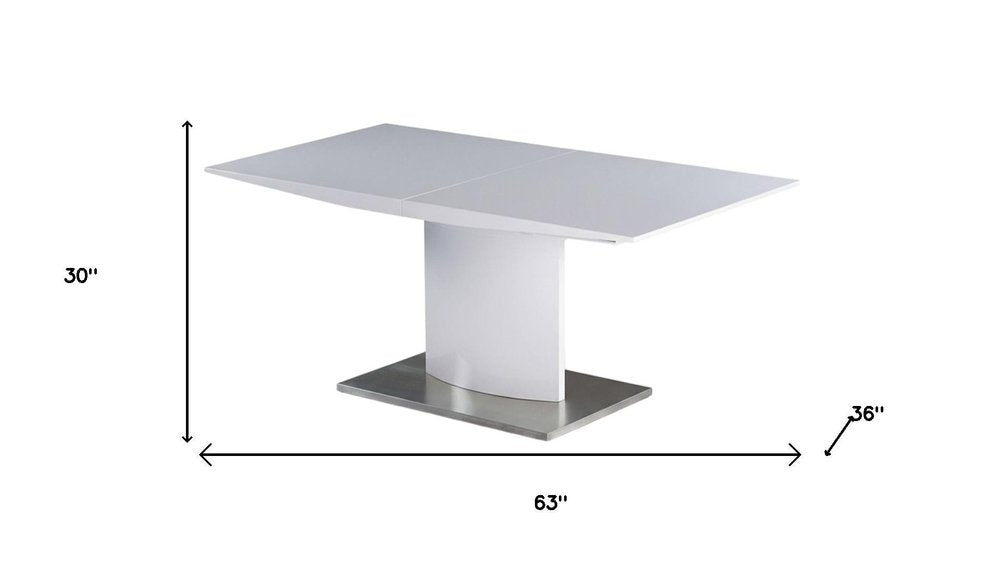 63" White Wood And Metal Self-Storing Leaf Pedestal Base Extendable Dining Table HomeRoots