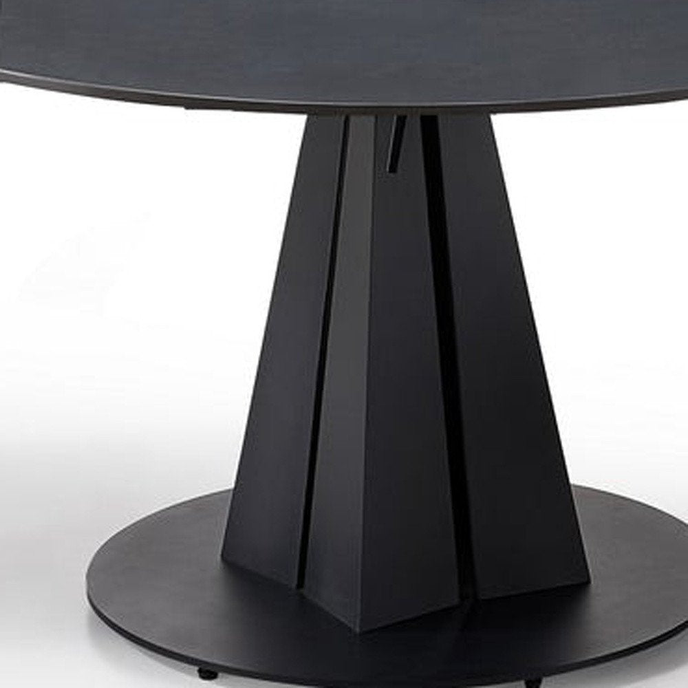 51" Black Stone and Metal Self-Storing Leaf Pedestal Base Round Top Extendable Dining Table HomeRoots