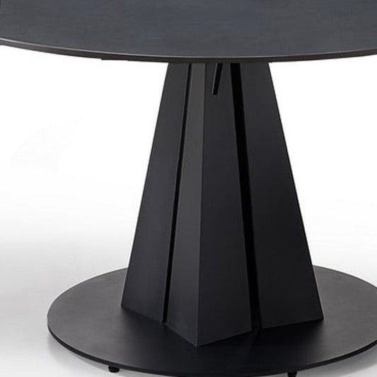 51" Black Stone and Metal Self-Storing Leaf Pedestal Base Round Top Extendable Dining Table HomeRoots