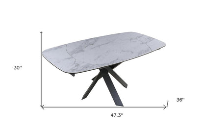 47" Gray and White Ceramic and Metal Self-Storing Leaf Cross Leg Base Oval Extendable Dining Table HomeRoots