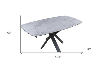 47" Gray and White Ceramic and Metal Self-Storing Leaf Cross Leg Base Oval Extendable Dining Table HomeRoots