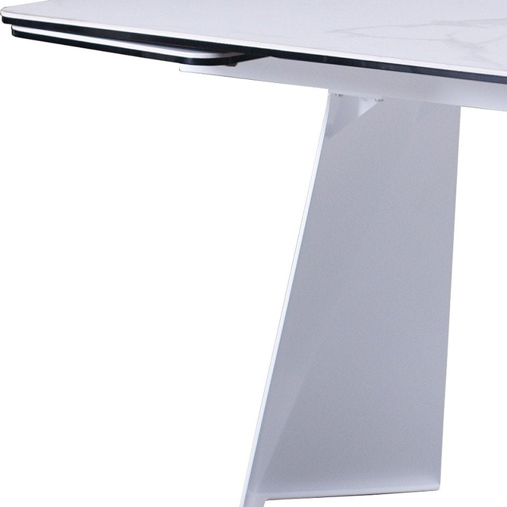 63" White Ceramic and Metal Self-Storing Leaf Pedestal Base Extendable Dining Table HomeRoots