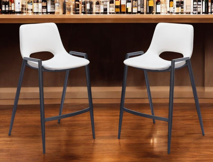 Set of Two 26" White and Black Faux Leather and Steel Low Back Counter Height Bar Chairs HomeRoots