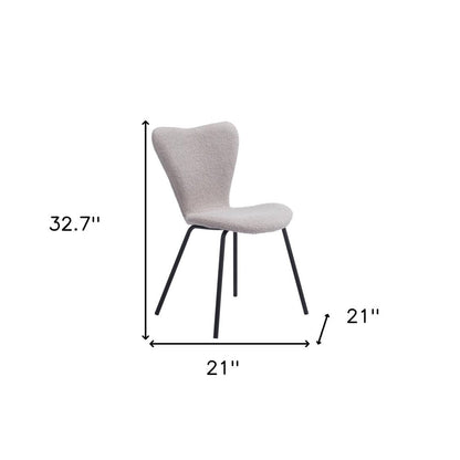 Set of Two Ivory And Black Faux Shearling And Steel Dining Side Chairs HomeRoots