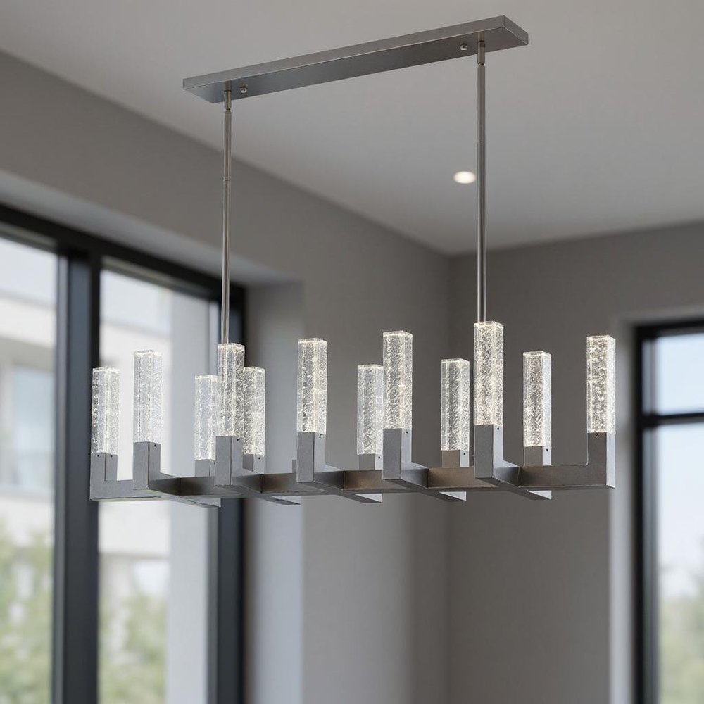 Silver And Clear Candle Style Twelve Light Metal Dimmable Chandelier With Clear Shades HomeRoots