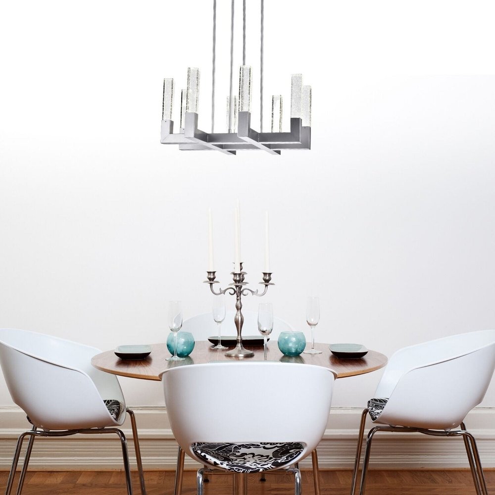 Silver Candle Style Eight Light Metal Dimmable Chandelier With Clear Shades HomeRoots